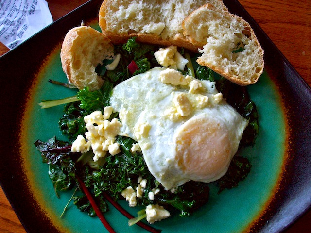 Eggs on greens with feta (Eat Me. Drink Me.)
