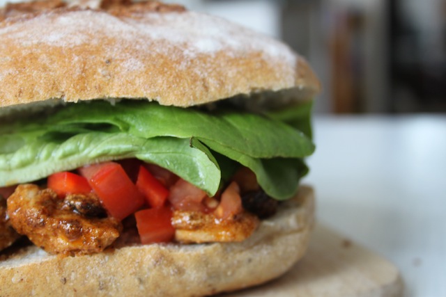 Curried chicken sandwich with raisins and pepper-tomato salsa (Eat Me. Drink Me.)