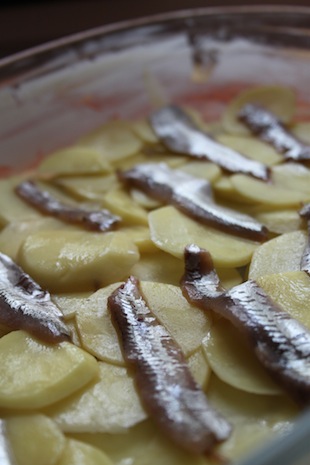 layers of anchovies for Jansson's Frestesle (Eat Me. Drink Me.)