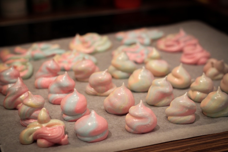Pastel meringues on a baking sheet (Eat Me. Drink Me.)