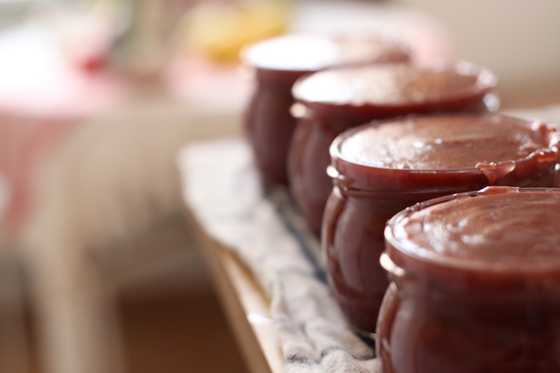 Jars of hot, homemade jam (Eat Me. Drink Me.)