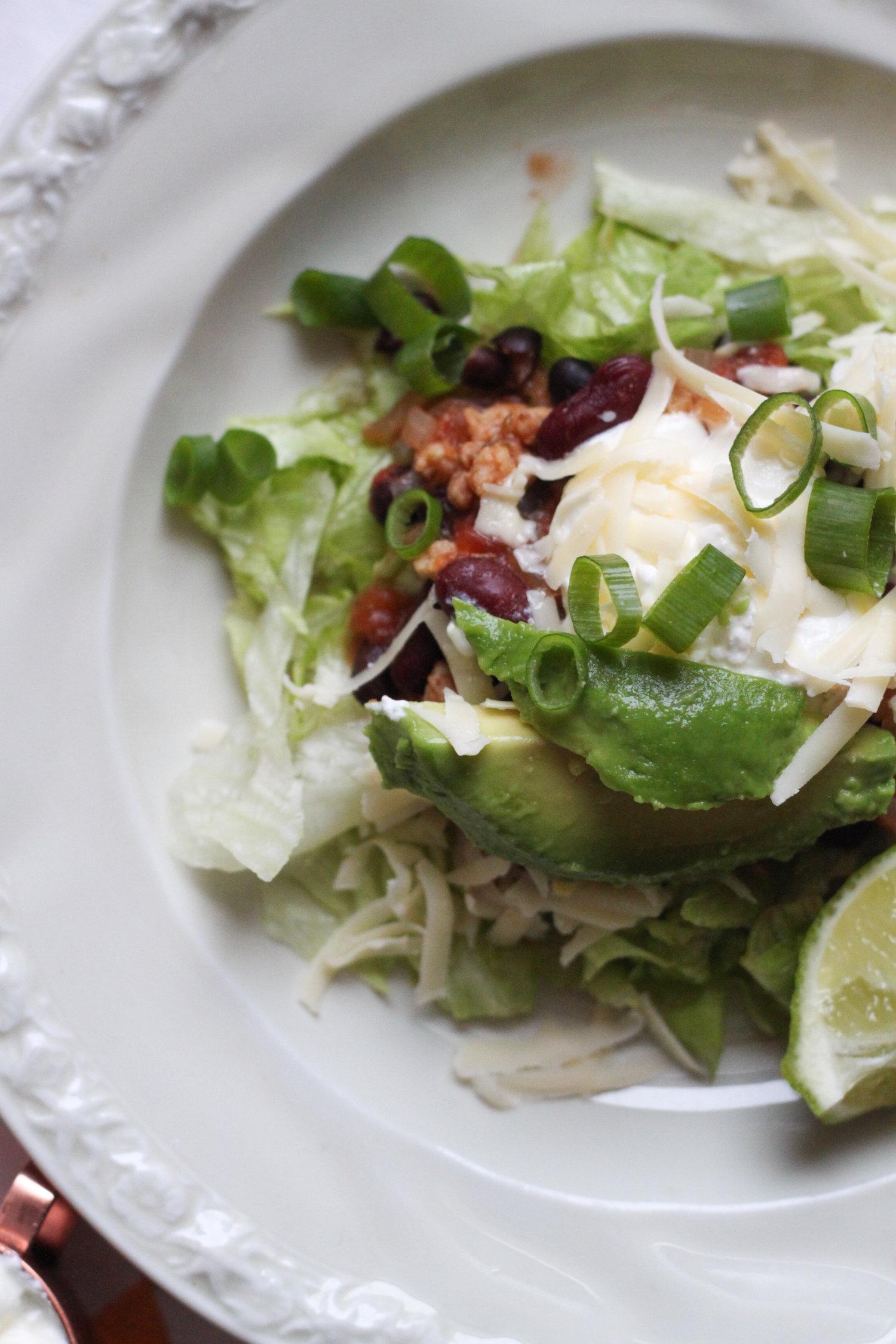 Vegetarian chili bowl with avocado and lime (Eat Me. Drink Me.)