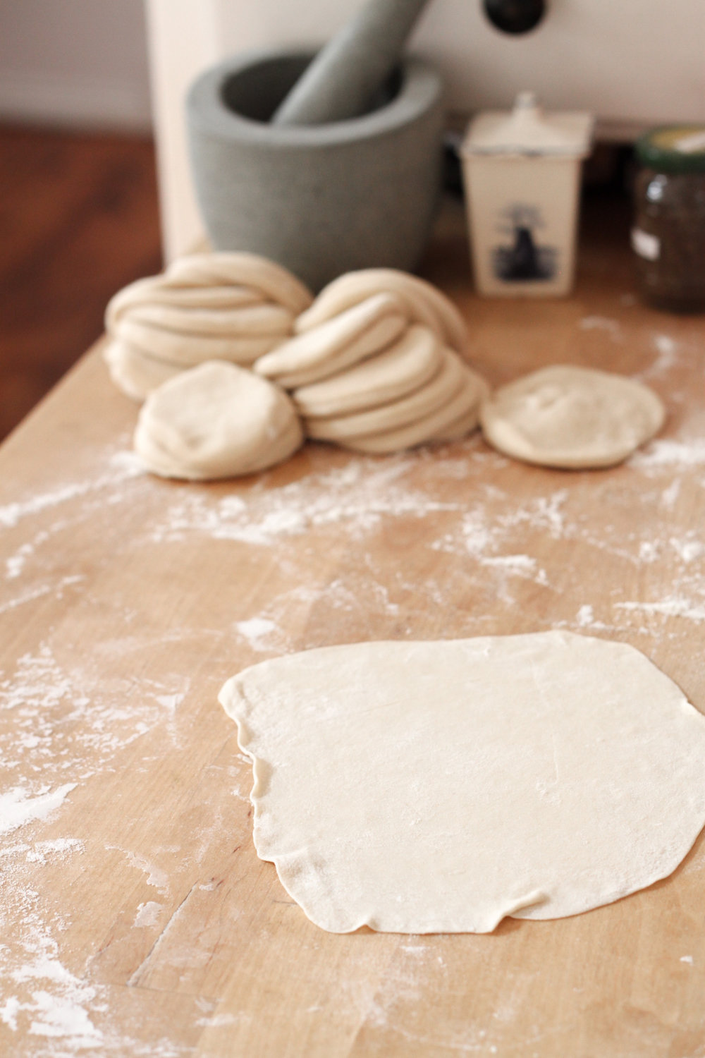 Rolling out dumpling dough (Eat Me. Drink Me.)