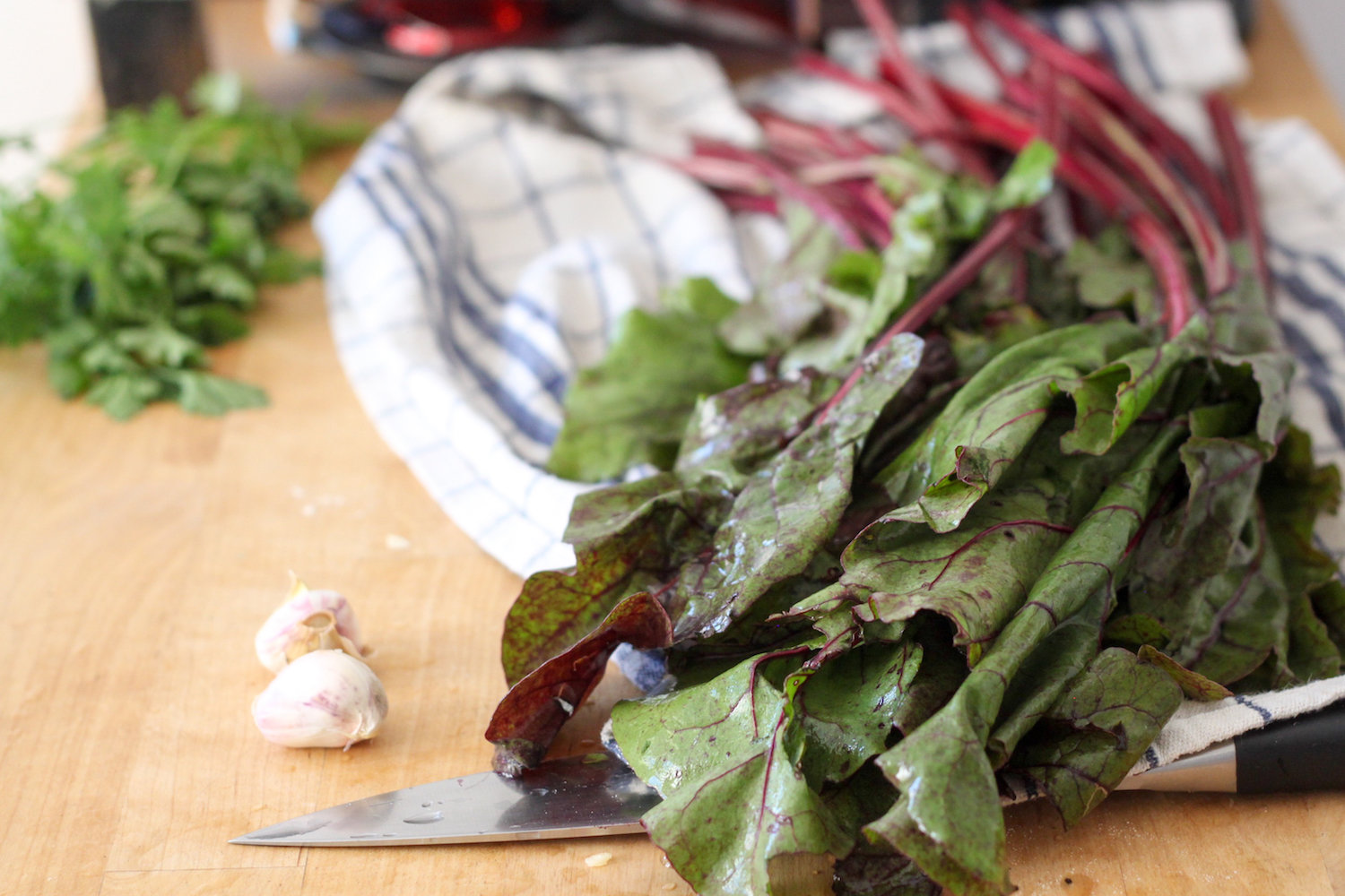 Greens and raw garlic (Eat Me. Drink Me.)