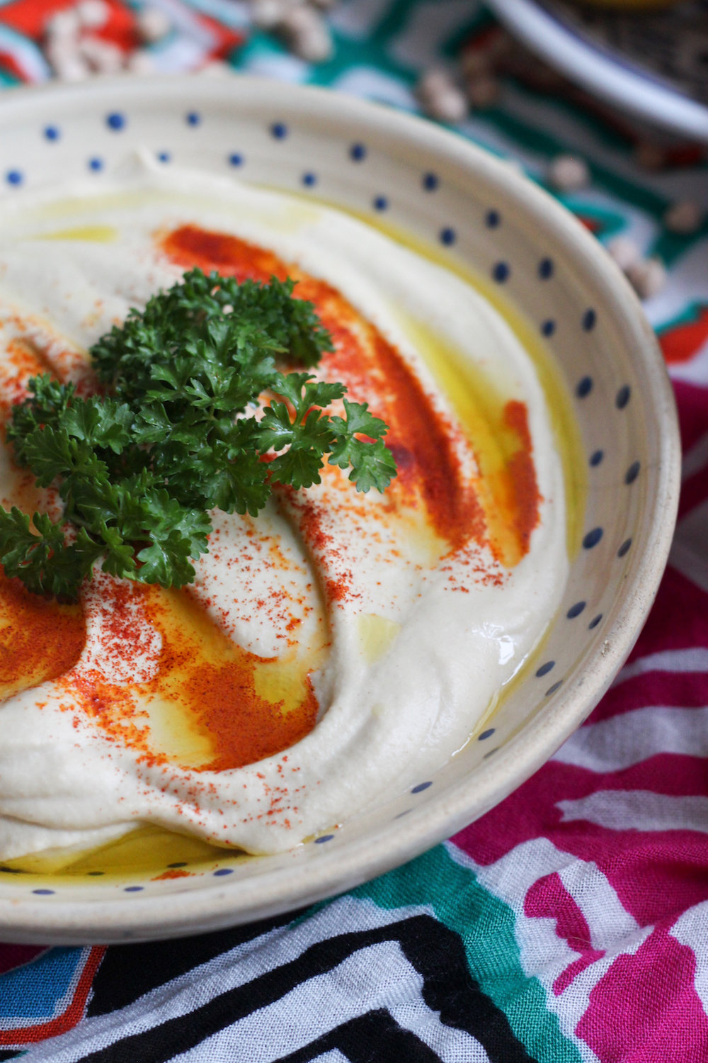 Hummus drizzled with olive oil and paprika (Eat Me. Drink Me.)