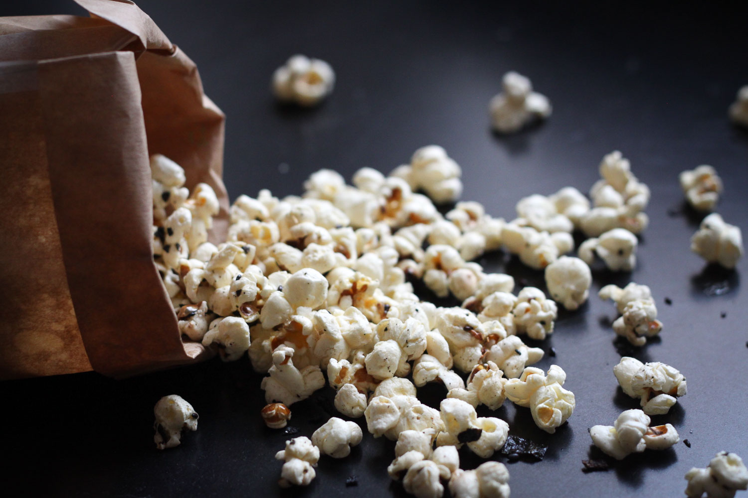 Spilled popcorn for snacking (Eat Me. Drink Me.)