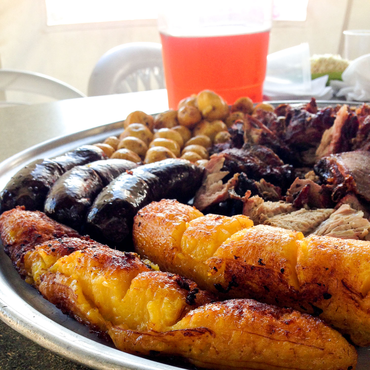 Potatoes, blood sausage, plantain, and barbecue in Colombia (Eat Me. Drink Me.)