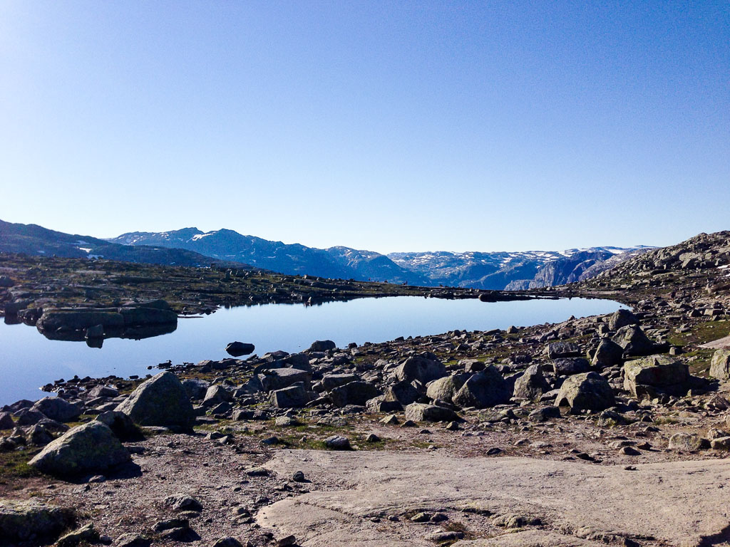 Placid lake, Trolltunga, Norway (Eat Me. Drink Me.)