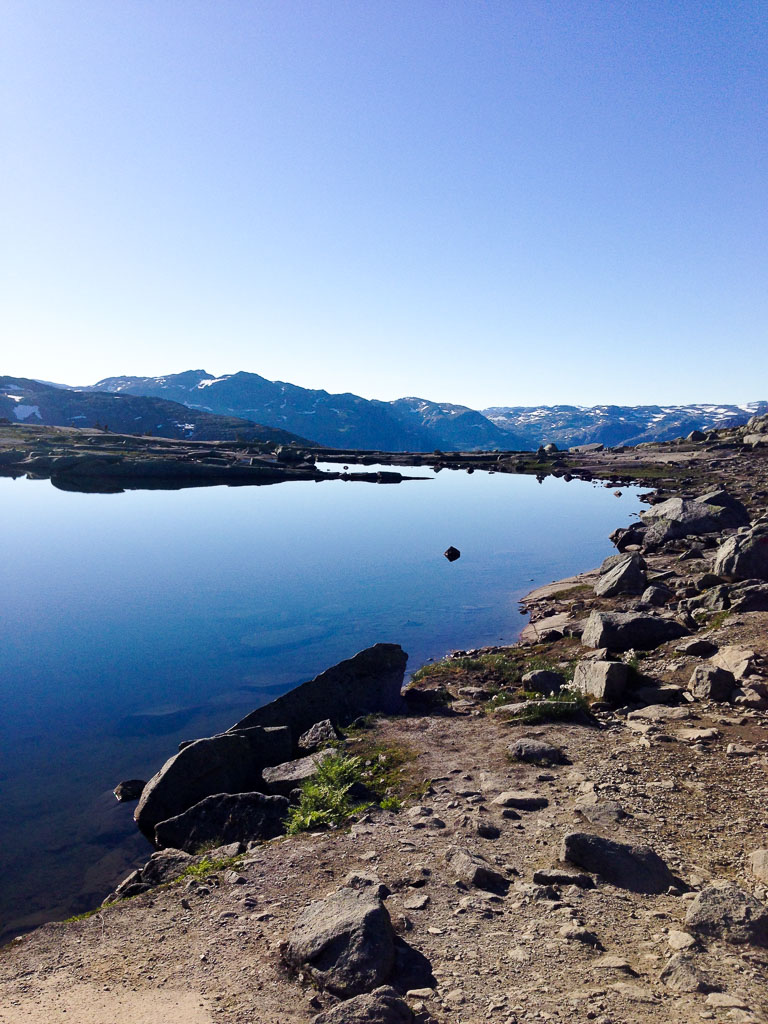 Glassy lake on the Trolltunga Hike, Norway (Eat Me. Drink Me.)