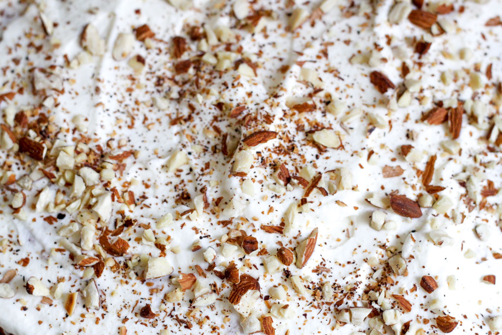 Whipped cream and almonds (Eat Me. Drink Me.)