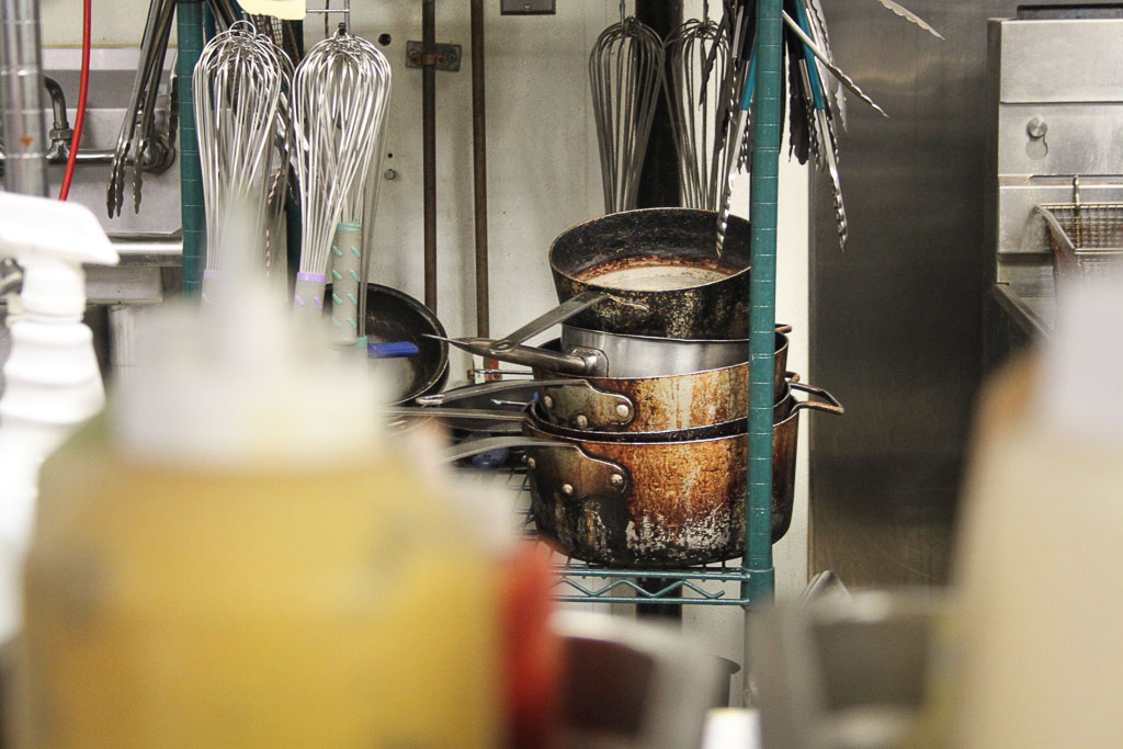 Pots and pans in the kitchen (Eat Me. Drink Me.)