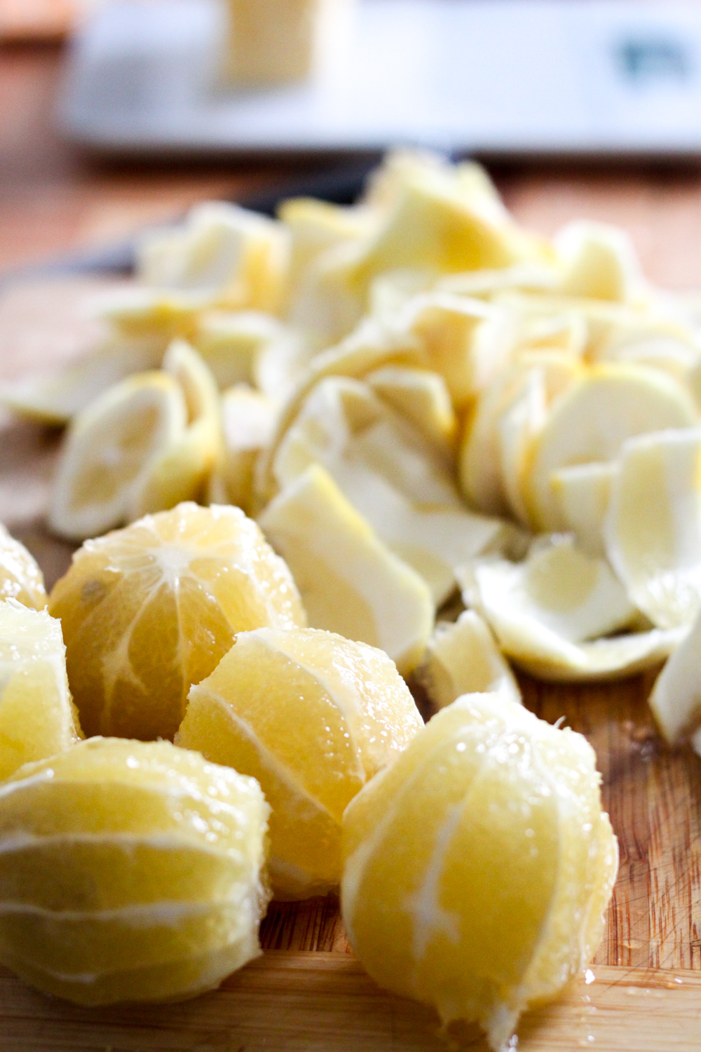 Cutting the rinds off lemons (Eat Me. Drink Me.)